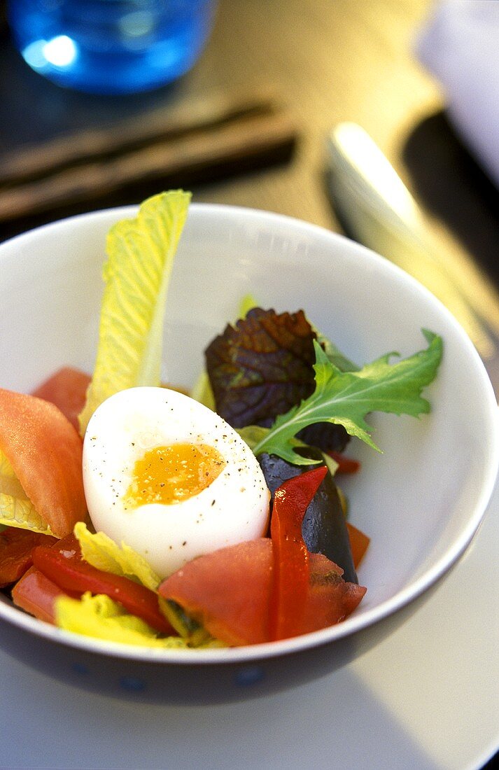 Soft egg with lettuce and fish