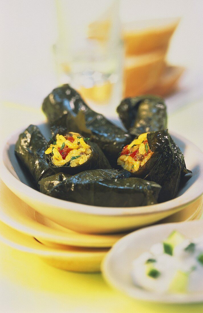 Vine leaves stuffed with rice and yoghurt and cucumber sauce