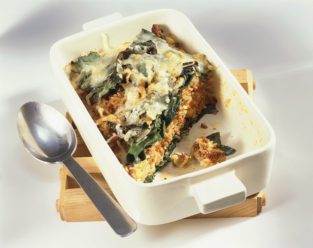 Chard and rice bake with mince in baking dish