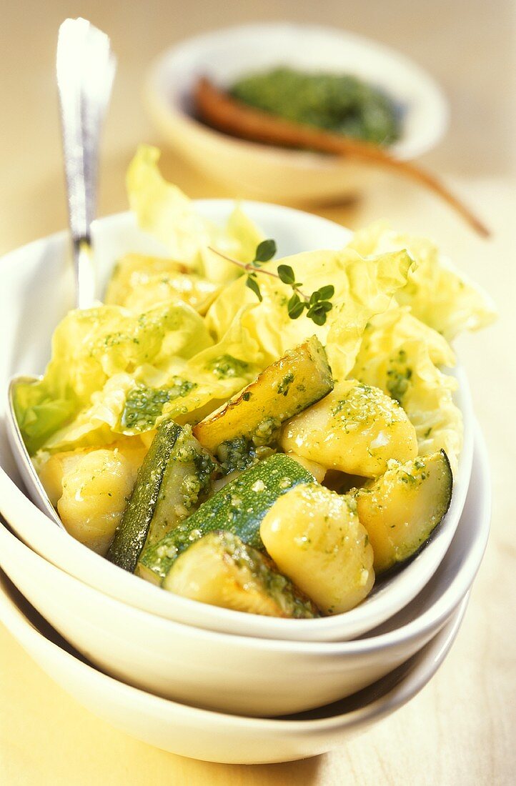 Courgette ragout with potato gnocchi and lettuce