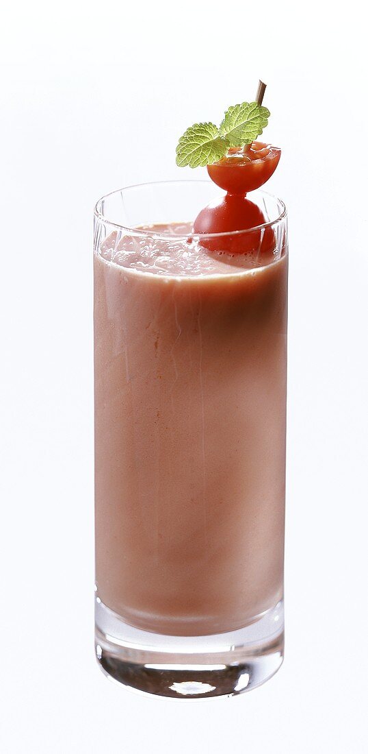 Tomato kefir drink with cherry tomato on cocktail stick