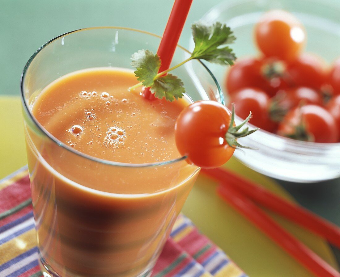 Spicy tomato drink garnished with cherry tomato