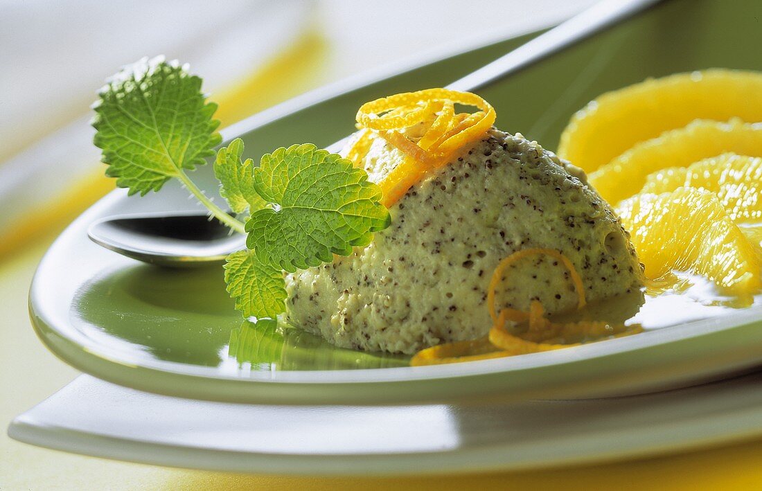 Poppy seed dumplings with oranges and lemon balm