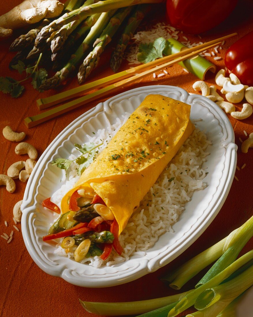 Asparagus wrap with peppers on rice