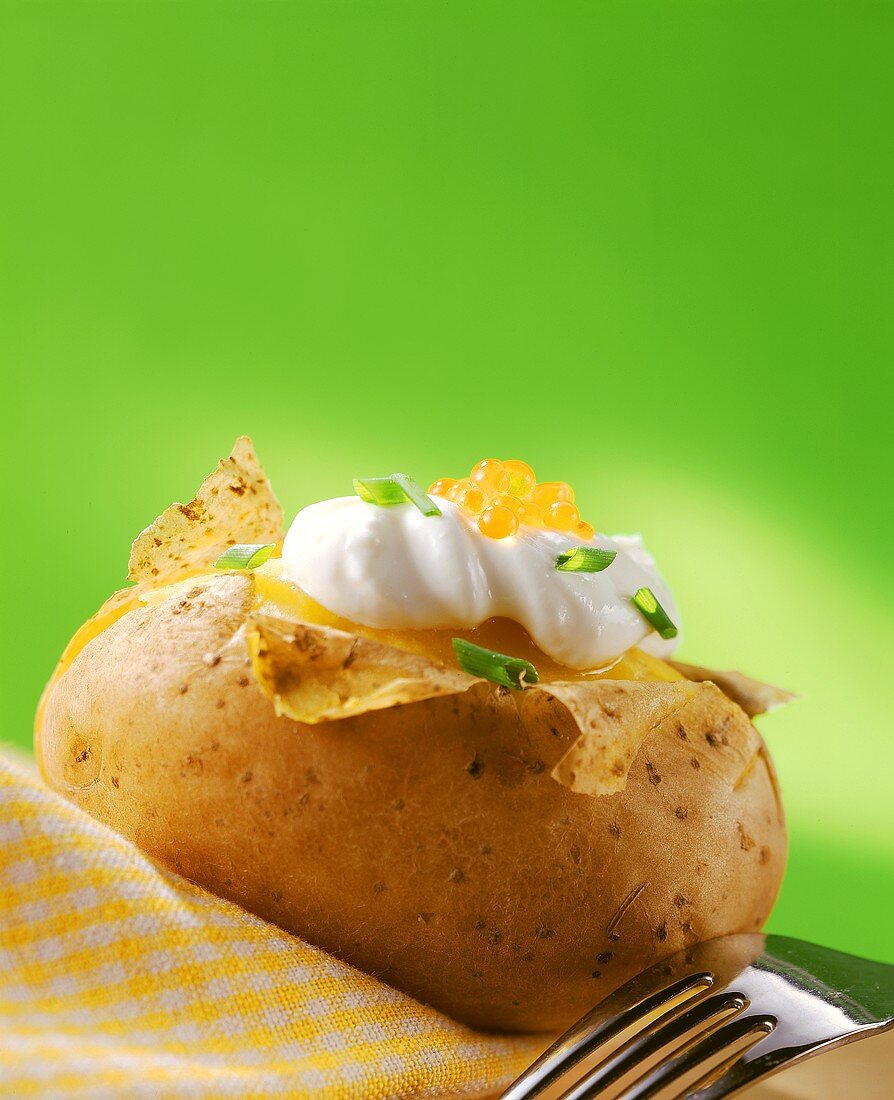 Baked potato with crème fraiche and caviare