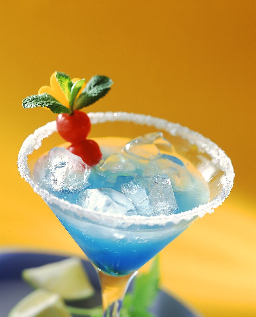 Cocktail with Blue Curacao in glass with sugared rim