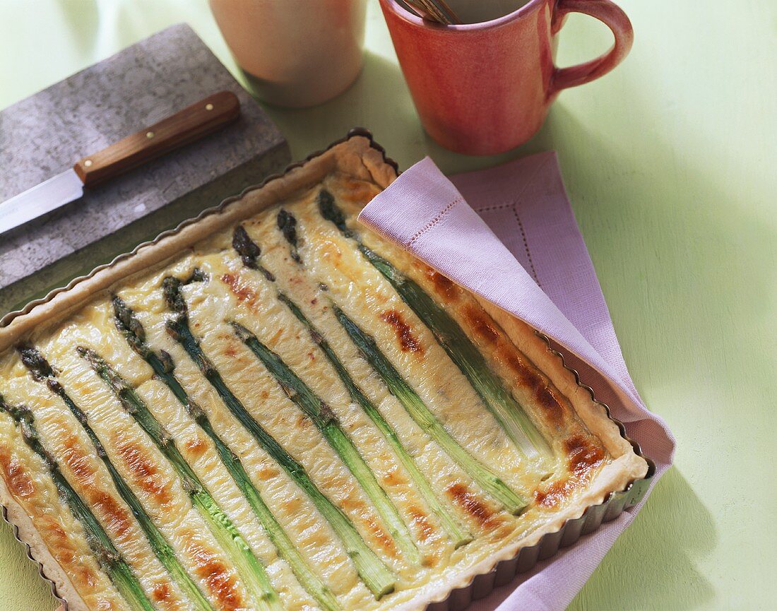 Green asparagus tart in the baking dish