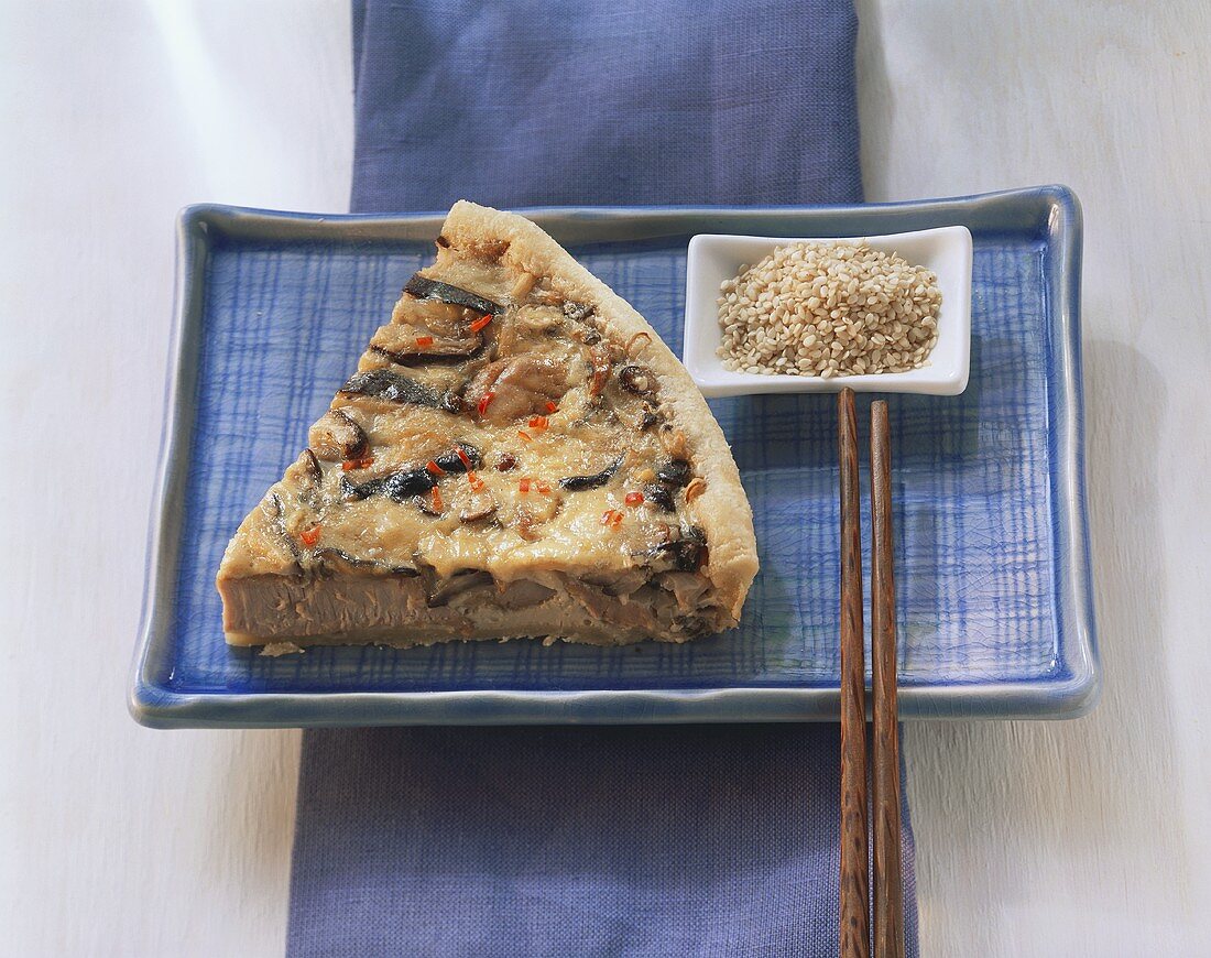 Asian-style quiche with pork fillet & mushrooms; sesame seeds
