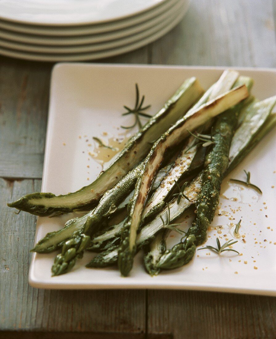 Roasted green asparagus in mustard oil