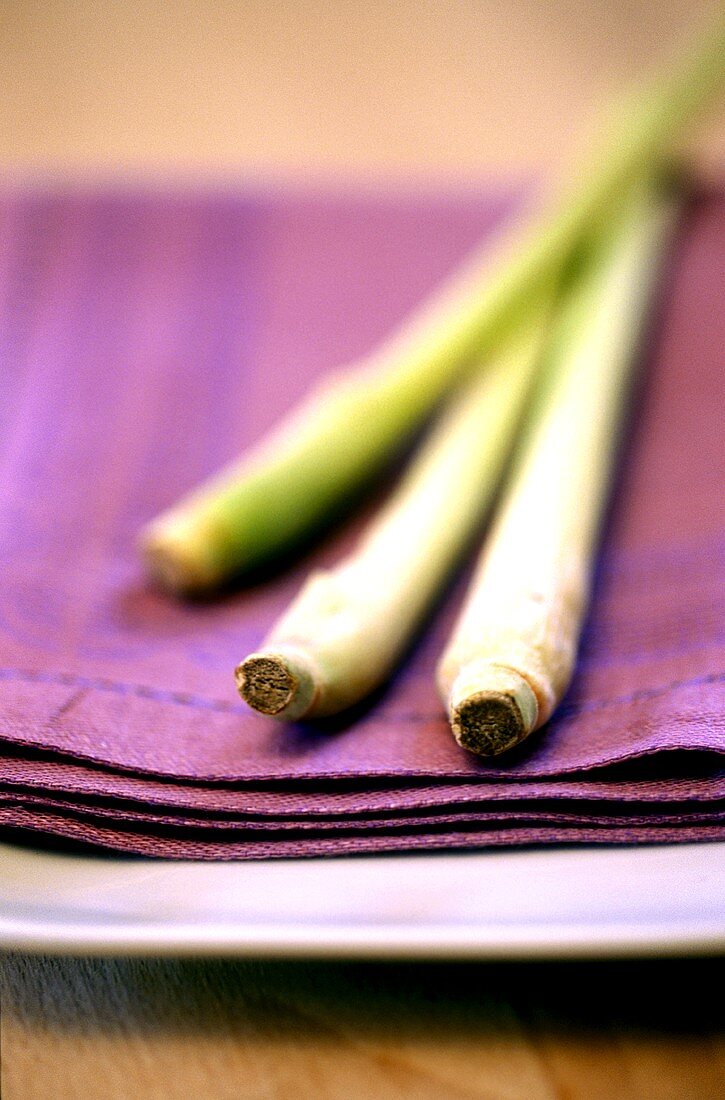 Lemon grass on purple napkin