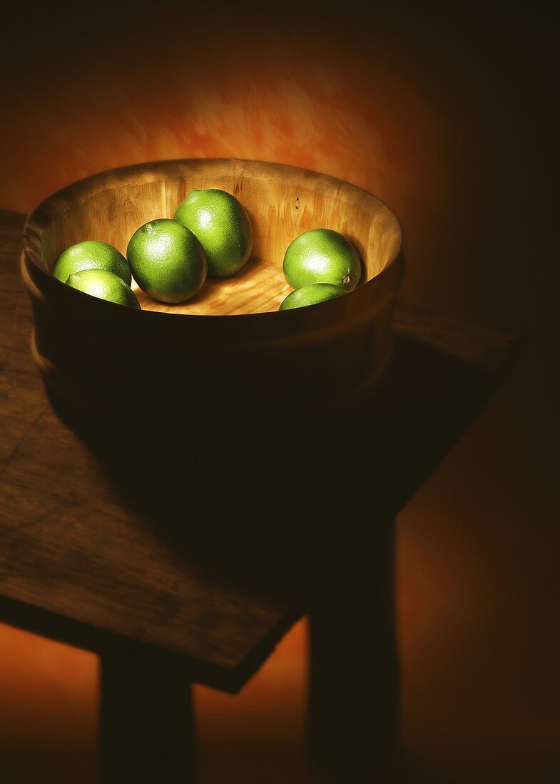 Limes in wooden bowl