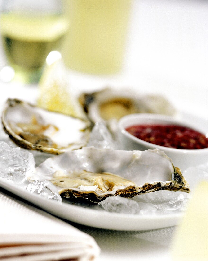 Oysters with spicy sauce