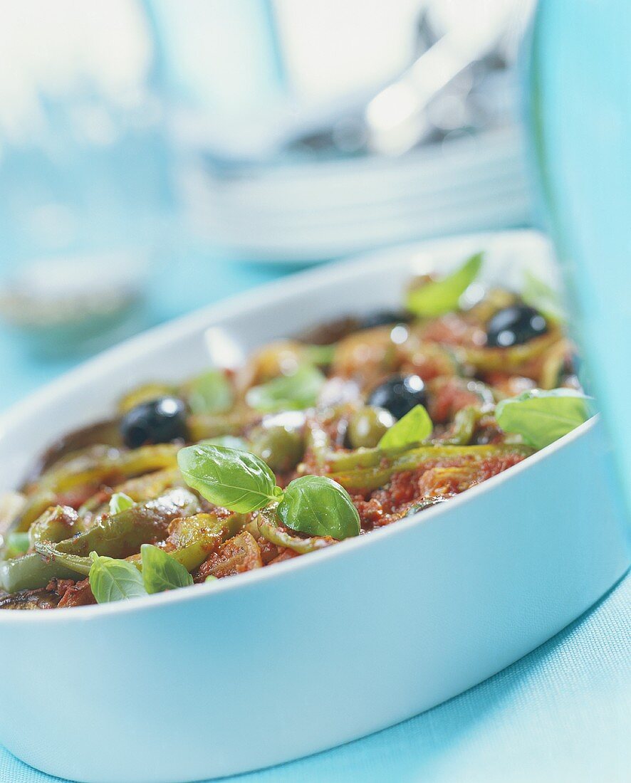 Vegetable casserole with olives and basil
