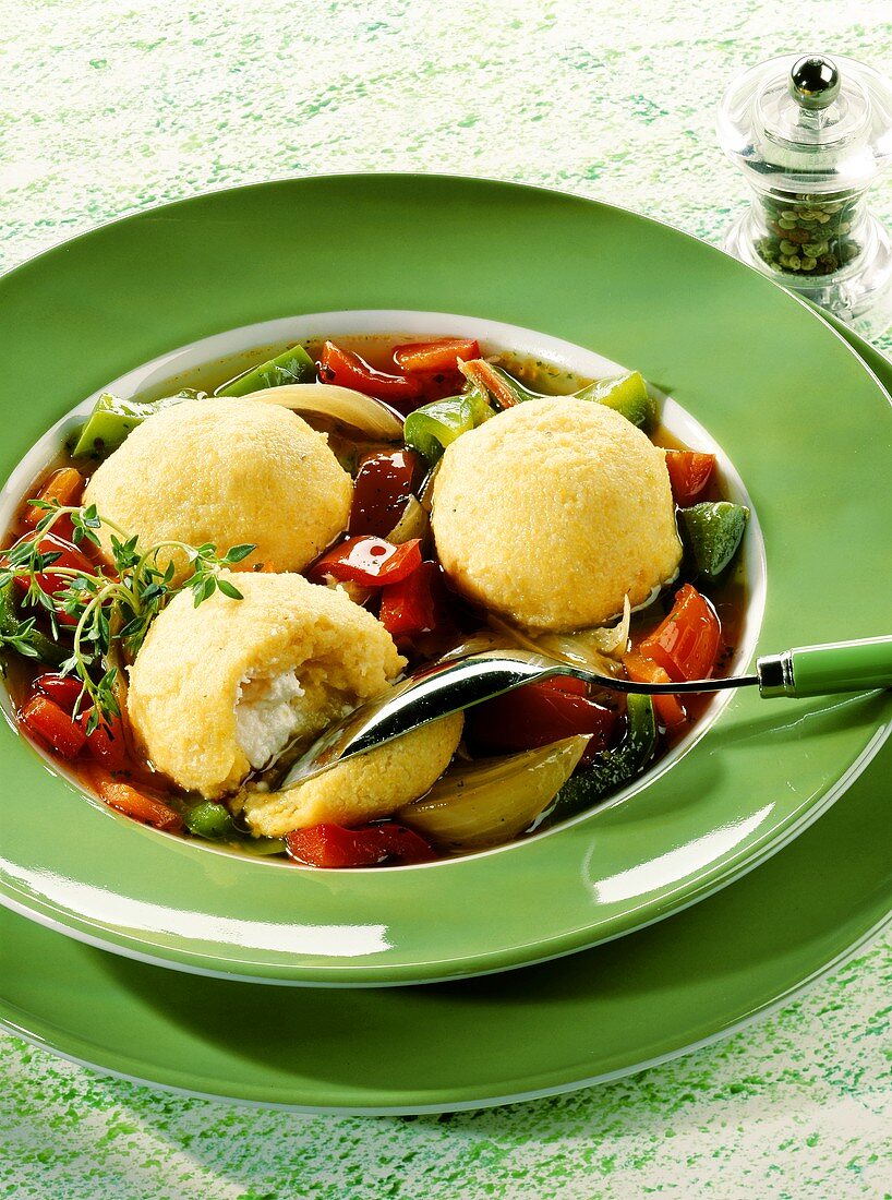 Pepper soup with polenta and sheep's cheese dumplings