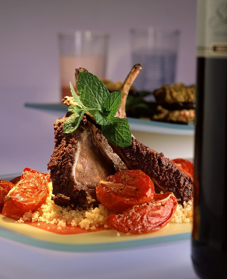 Lamb cutlets with couscous and tomatoes