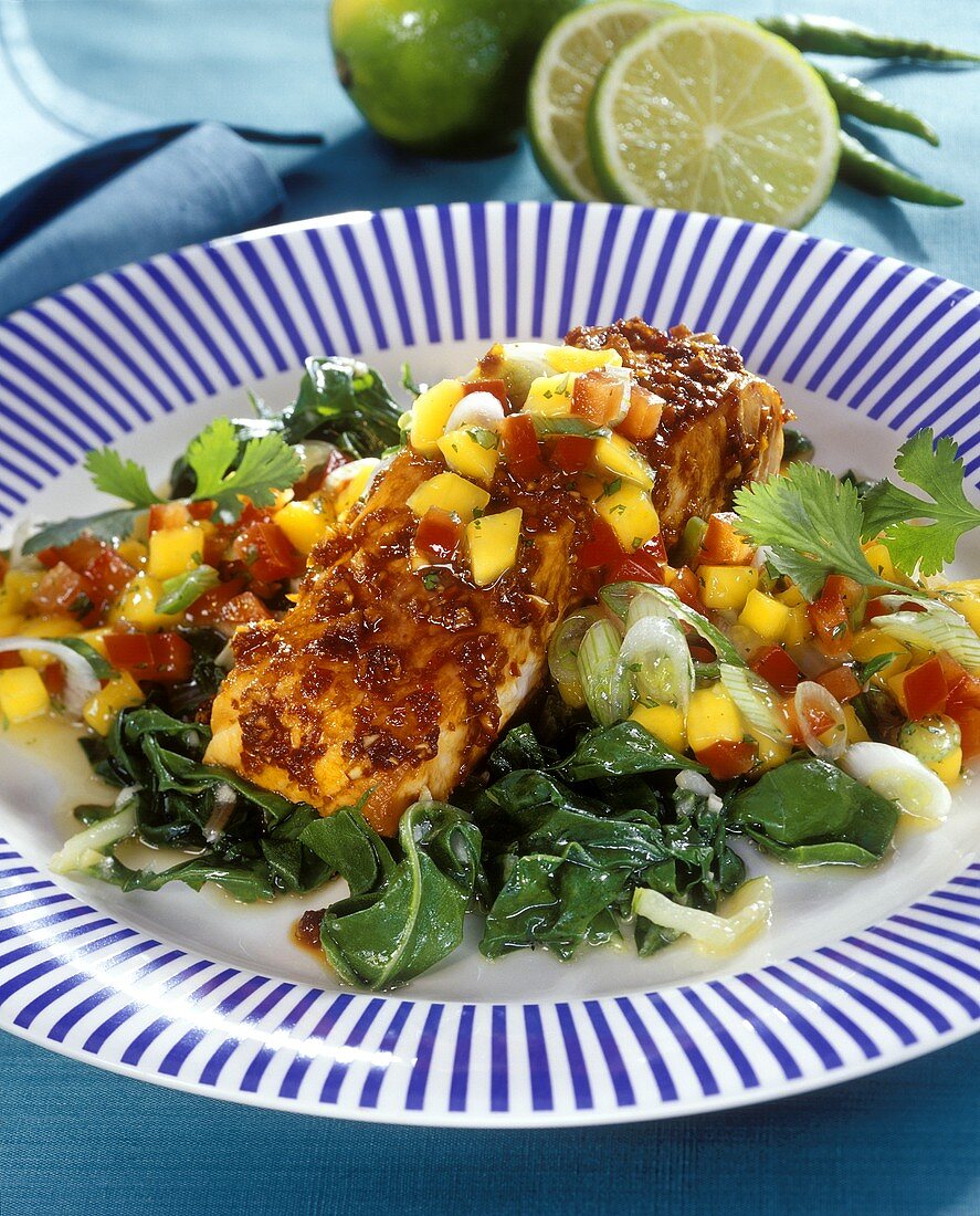 Barbecued salmon with mango salsa and chard