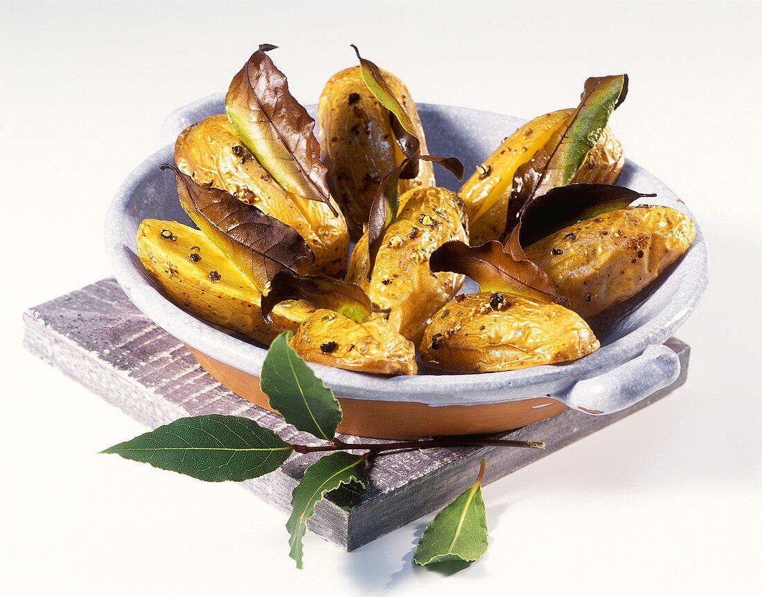 Baked potatoes with bay leaves