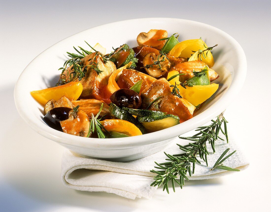 Pan-cooked tuna and vegetable dish with rosemary and thyme