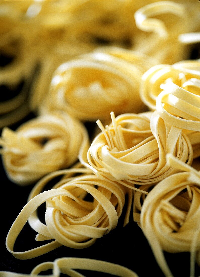 Tagliatelle on baking tray