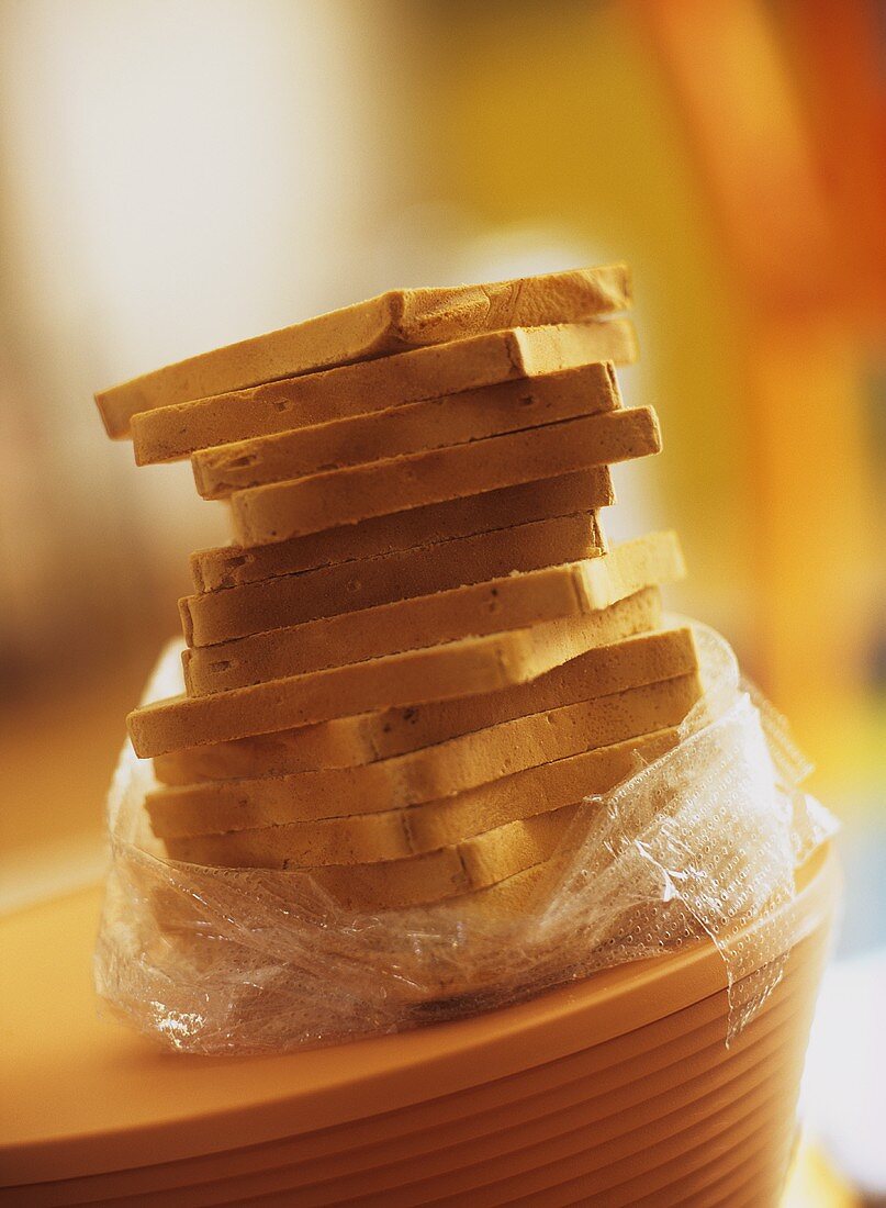 Slices of toast in a pile on plastic bag