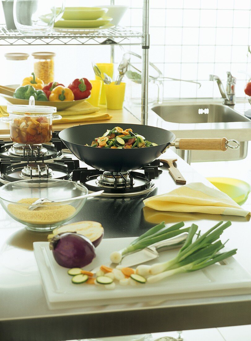 Kitchen scene with various ingredients for wok dish
