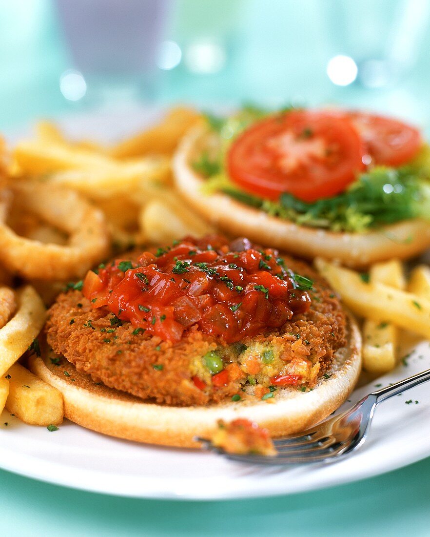 Vegetable burger with tomato sauce and chips