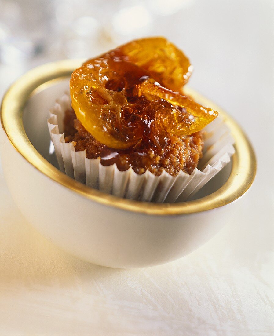 Small cake with candied kumquat