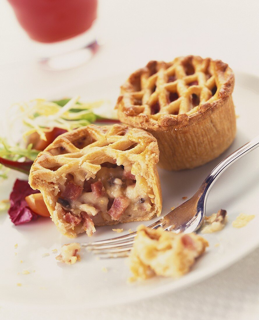 Cheese and ham pies, garnished with lettuce