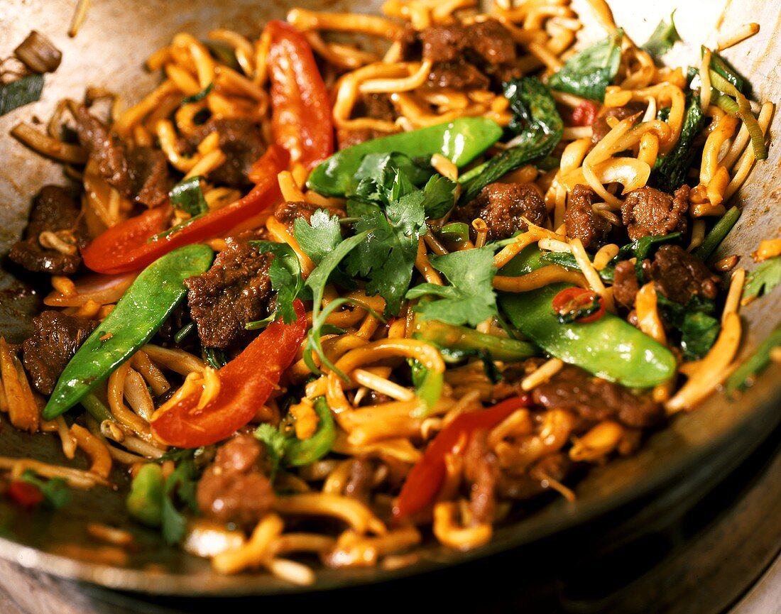 Beef curry with vegetables in wok