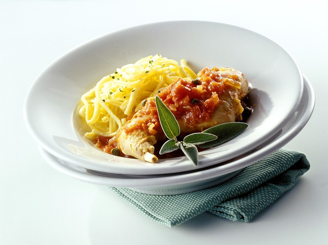 Geschmorte Kaninchenkeulen mit Spätzle, Tomaten, Salbei