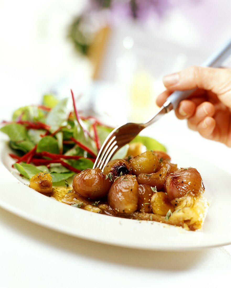 Pancakes with shallots and salad