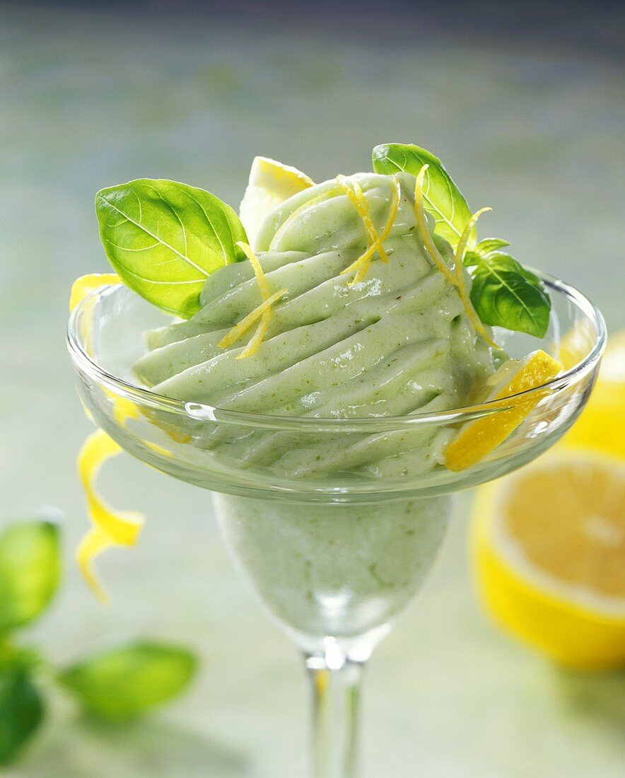 Basil cream with lemon in glass