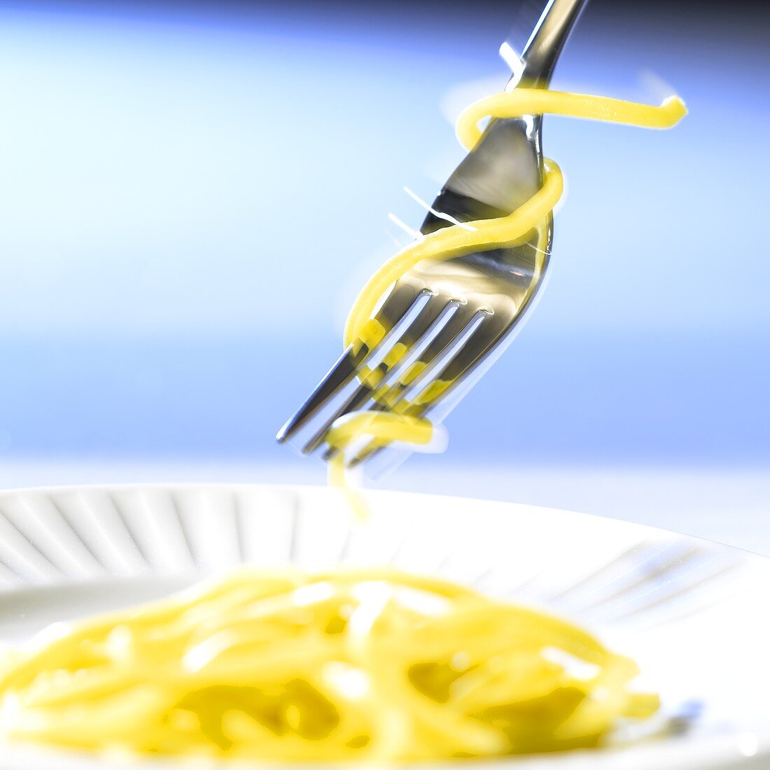 Spaghetti rolled around a fork