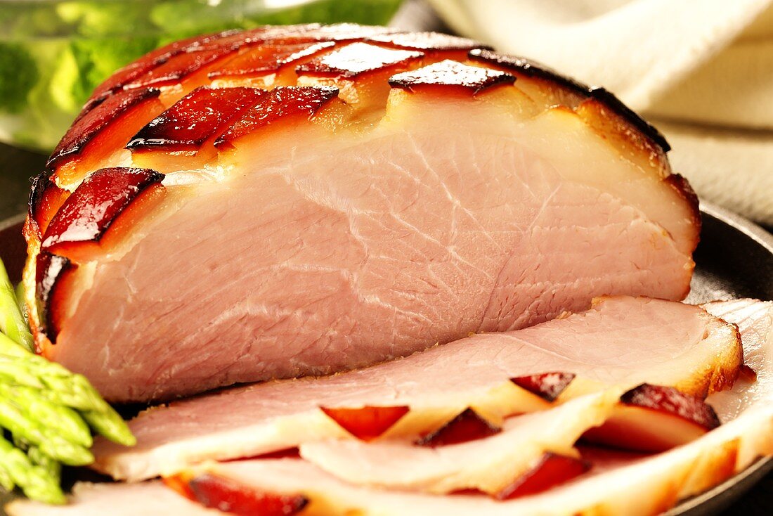 Glazed roast ham, a slice cut