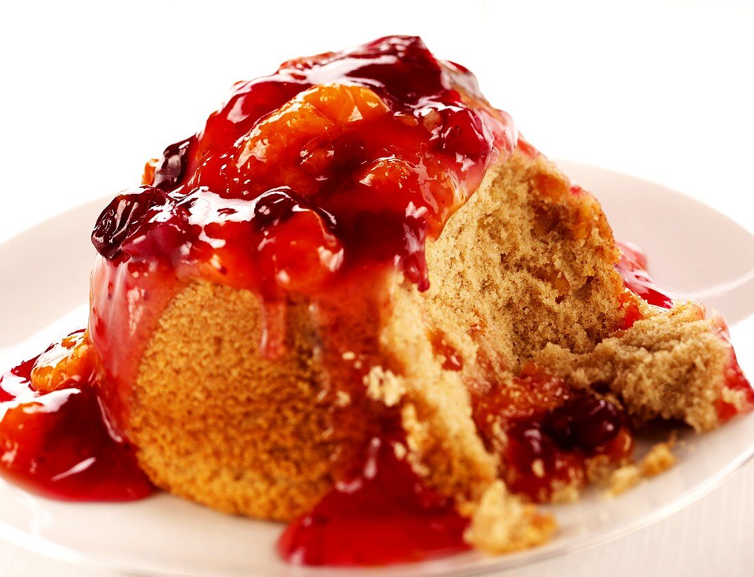 Bread pudding with cranberry and mandarin sauce