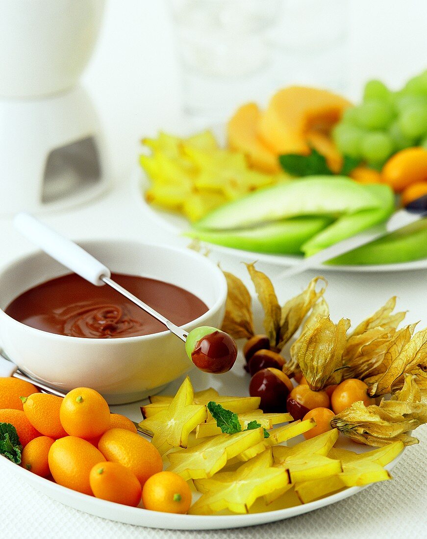 Chocolate fondue with exotic fruits