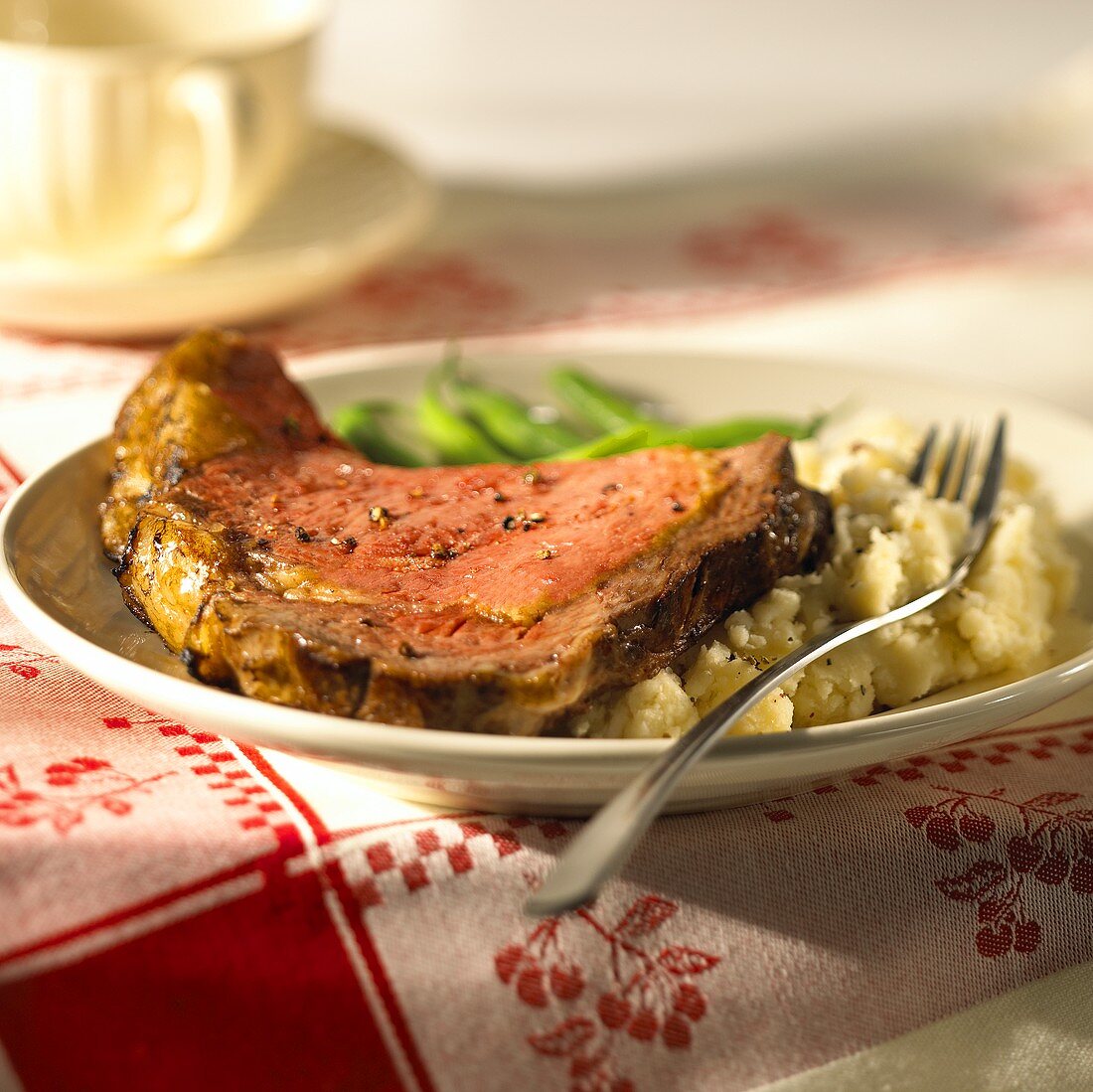Beef steak with mashed potato and green beans
