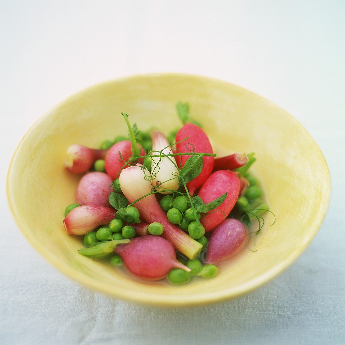 Pea and radish salad with spring onions