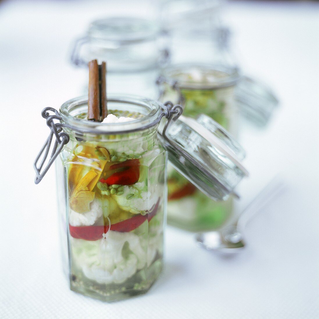 Pickled cauliflower with spices in pickling jar