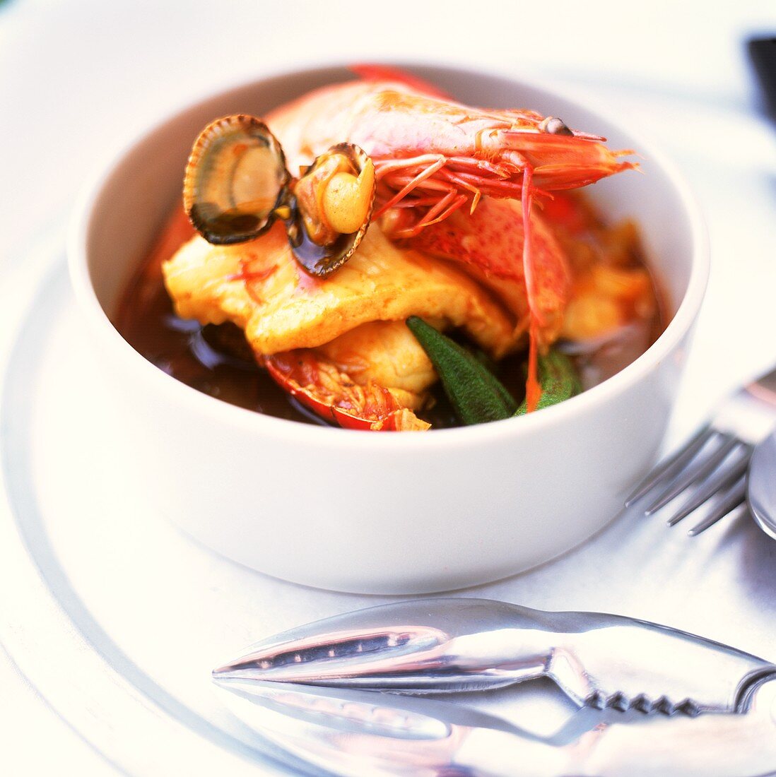 Thai fish and seafood stew with okra