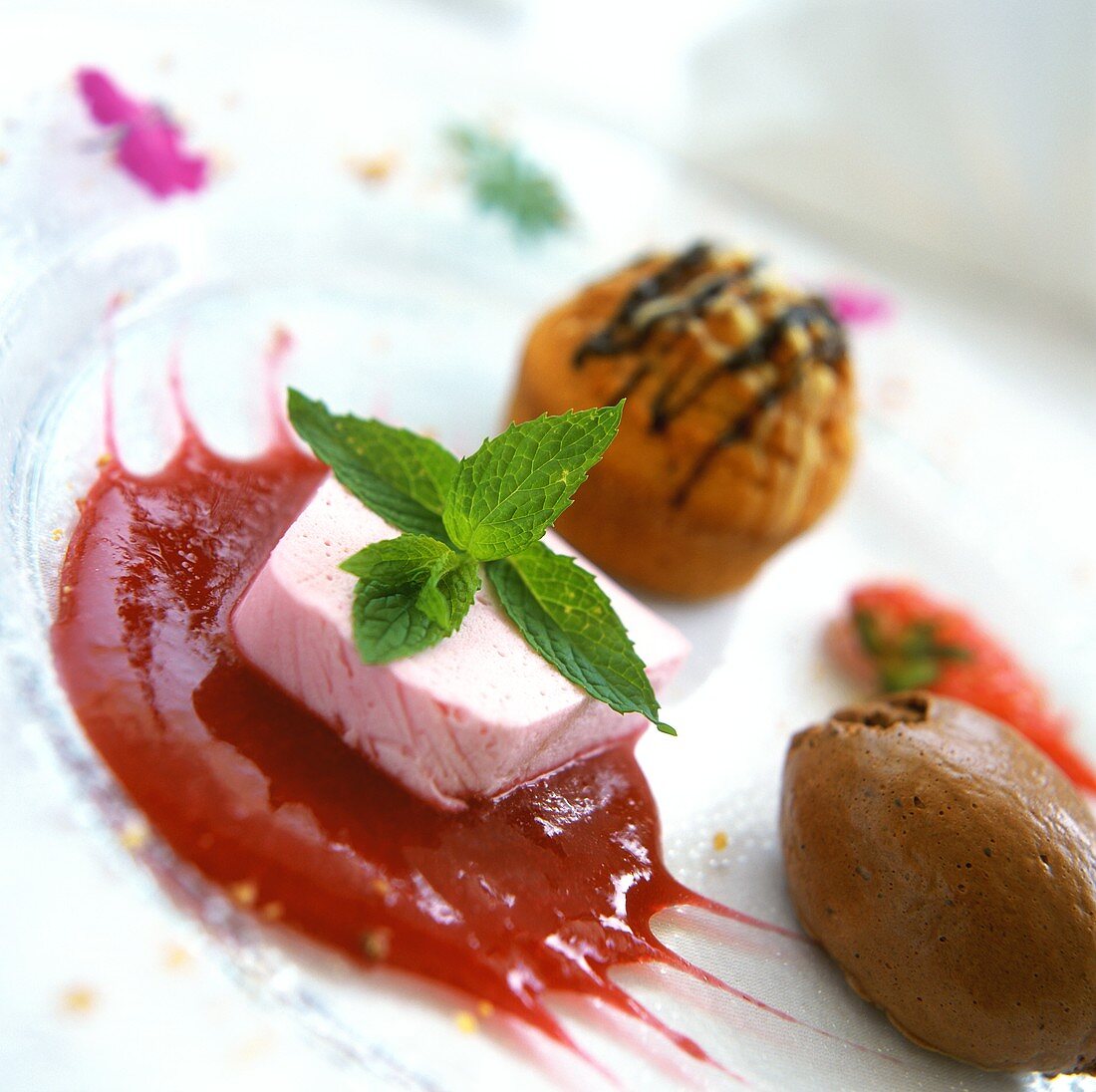 Dessert plates: chocolate mousse, strawberry ice in sauce etc.