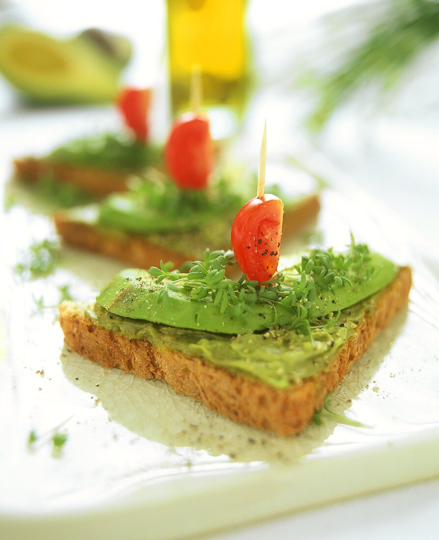 Wholemeal toast with avocado, tomato and cress