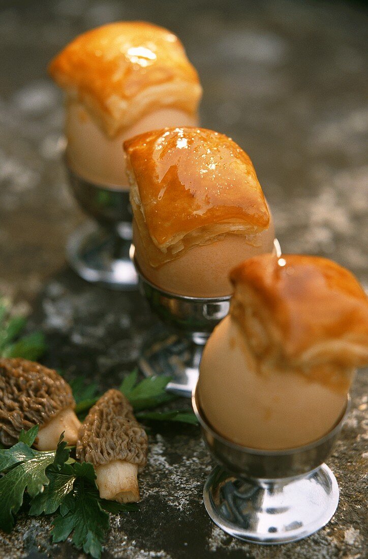 Surprise eggs with morels and goose liver vol-au-vents