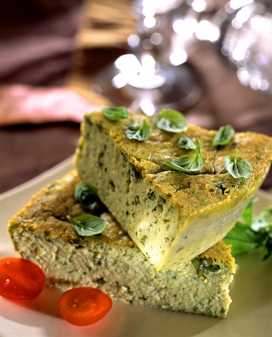 Basil flan with cherry tomatoes