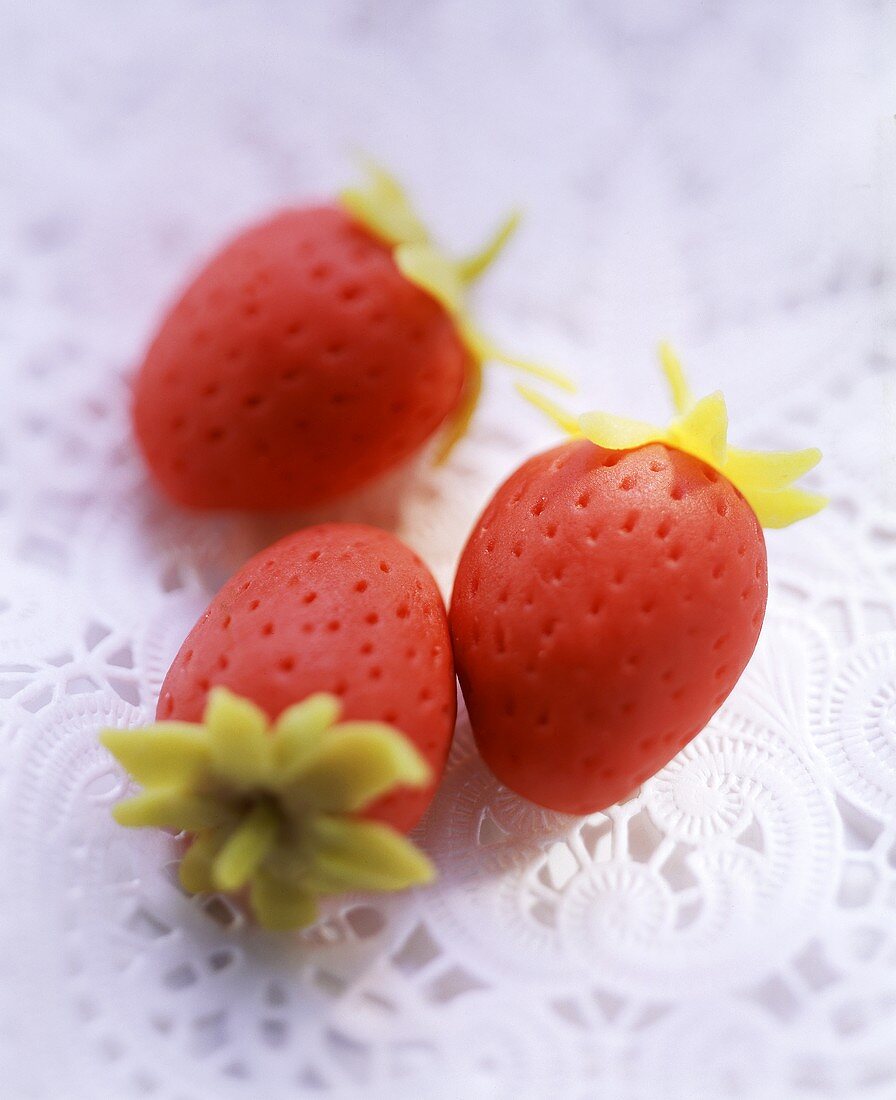 Marzipan strawberries on doily