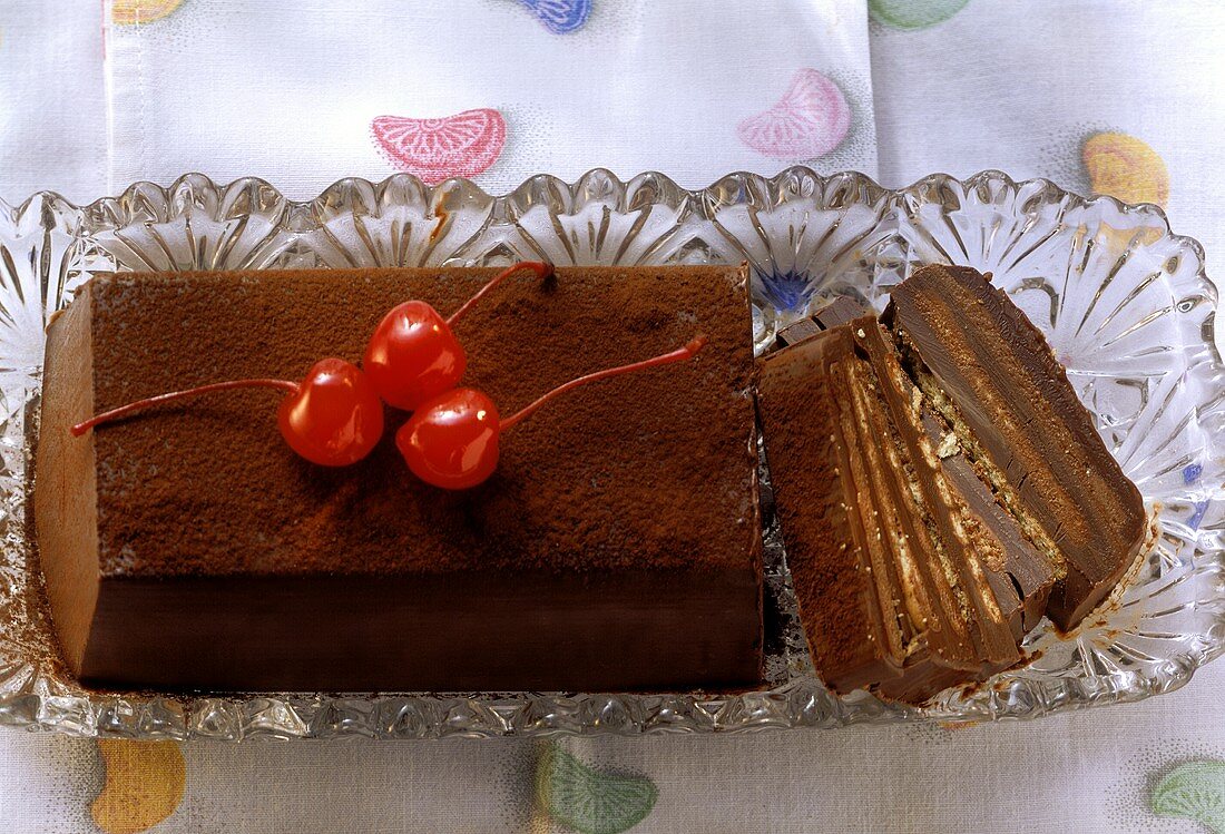 Chocolate cake with cocktail cherries