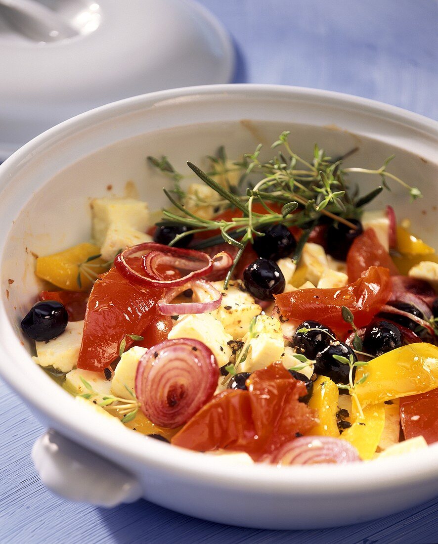 Warm sheep's cheese with vegetables and fresh herbs