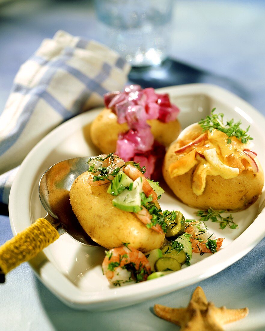 Filled potatoes with fish salads