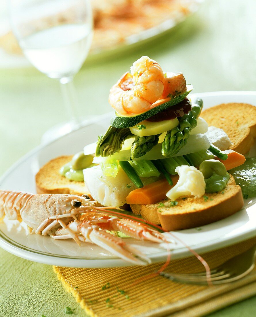 Cappon magro (layered fish and vegetables on zwieback (rusk))