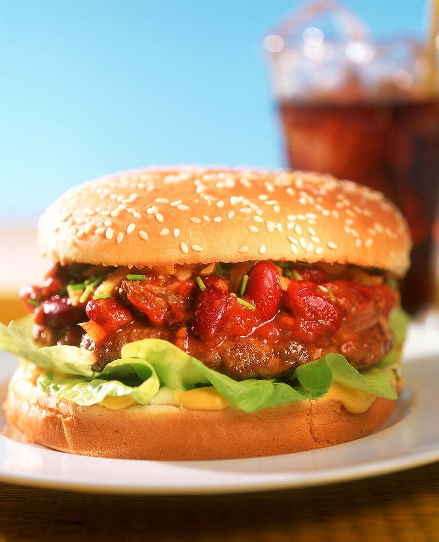 Hamburger with chili con carne sauce